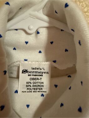 Obermeyer White Ski Top with Blue Heart Print